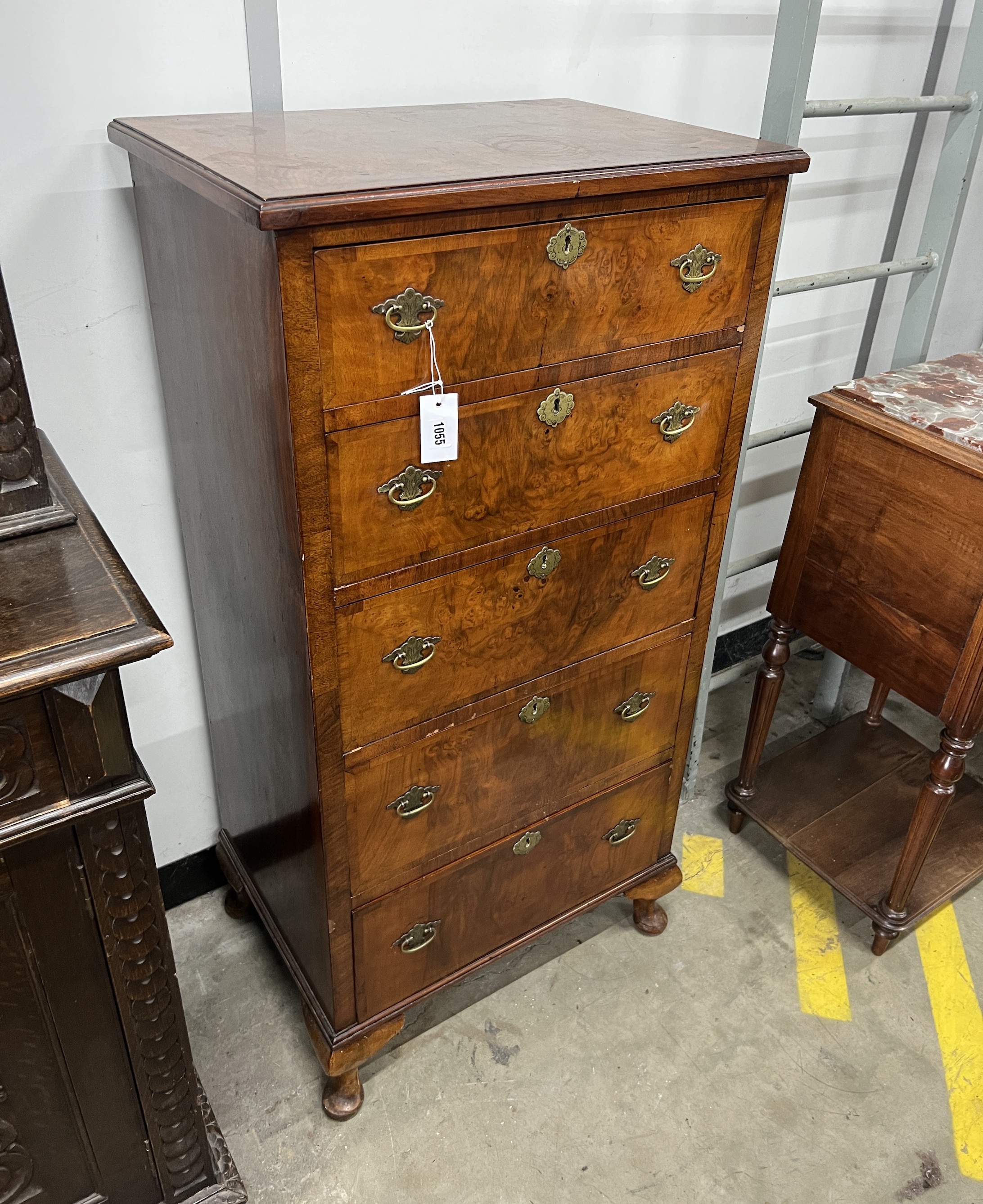 A Queen Anne revival narrow walnut five drawer chest, width 61cm, depth 42cm, height 122cm